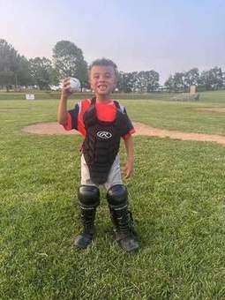 A Winchester Little League player at the ballpark in 2023.